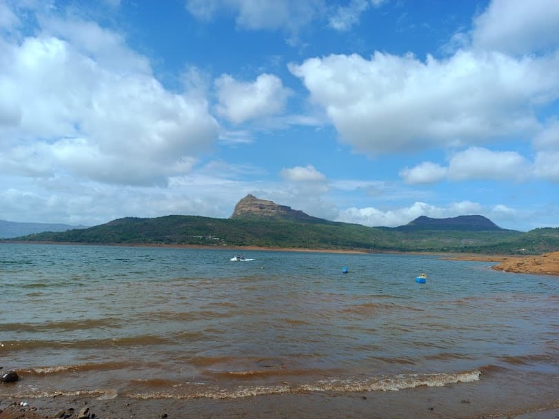 Lakeside camping with bonfire